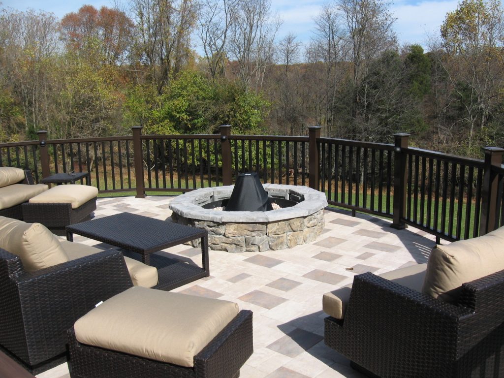 outdoor patio with built in fireplace